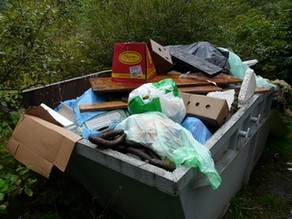 Overflowing waste container